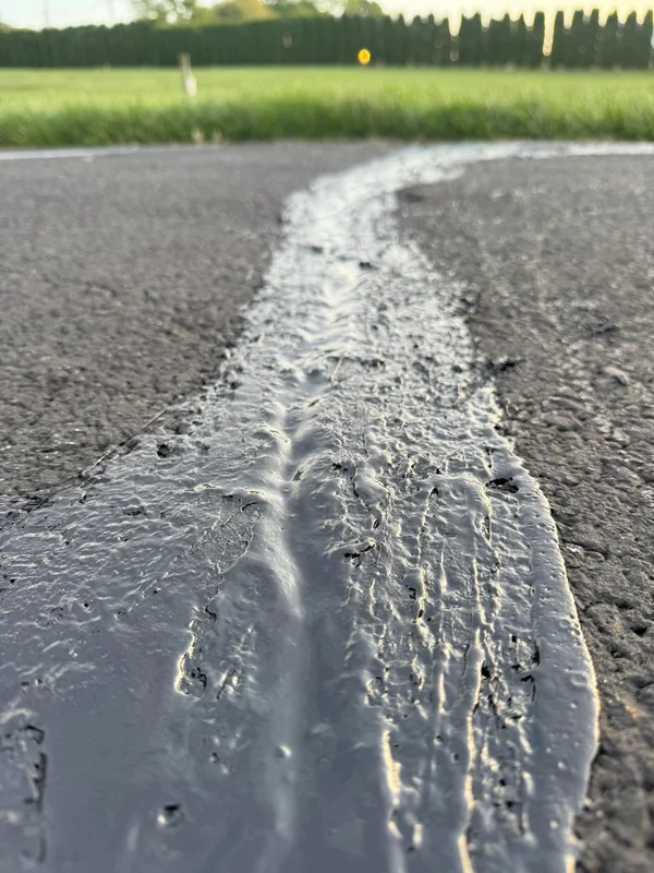 Finished asphalt project after professional maintenance, result 8